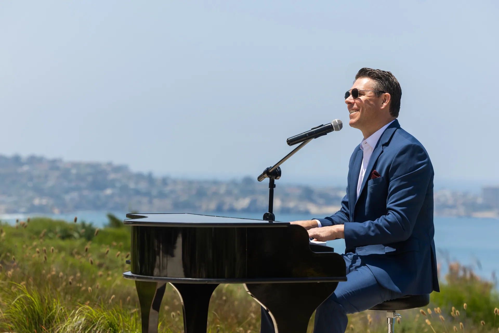 Brian Wahlstrom singing and playing piano